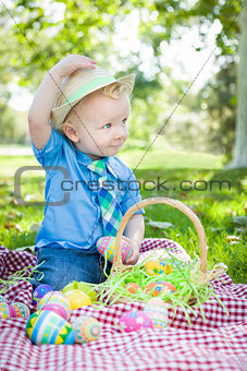 Cute Little Boy Outside Holding Easter Eggs Tips His Hat
