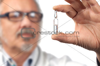 caucasian mature male doctor on bright background
