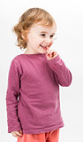 abashed young girl in light grey background