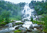 Summer Tvindefossen waterfalls (Norway)