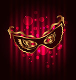 Carnival or theater mask on glowing background