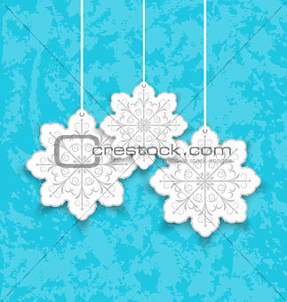 Set Christmas paper snowflakes on blue grunge background
