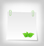 blank note paper with green leaves, isolated on white background