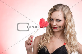 lovely woman with red lollipop 