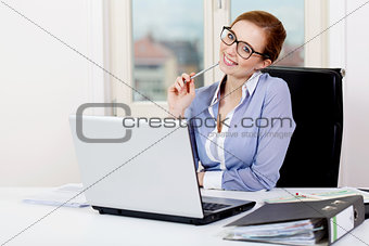young successful business woman in office