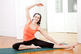 young attractive woman doing pilates