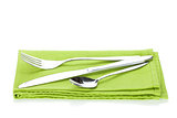 Silverware or flatware set of fork, spoon and knife over kitchen