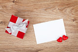 Blank valentines greeting card and small red gift box