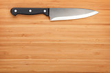 Kitchen knife on cutting board