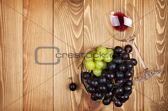 Red wine glass and grape