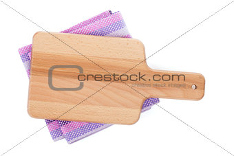Cutting board over kitchen towel
