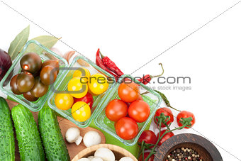 Fresh ingredients for cooking: tomato, cucumber, mushroom and sp