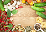 Fresh ingredients for cooking: pasta, tomato, cucumber, mushroom