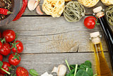 Fresh ingredients for cooking: pasta, tomato, mushroom and spice