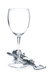 Wine glass and corkscrew