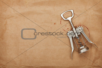 Corkscrew with red wine stains