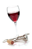 Red wine glass, cork and corkscrew