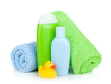 Bath bottles, towel and rubber duck