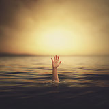 A hand coming out of the water