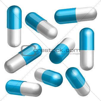 Set of blue and white medical capsules in different positions