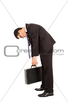 exhausted businessman stoop and holding briefcase