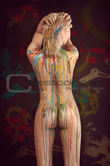 blond nude girl with multicolor paint