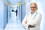 caucasian mature male doctor on background