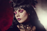 Portrait of romantic gothic girl with artistic makeup 
