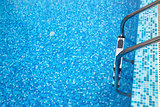 Part of swimming pool with ladder 