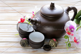 set for a traditional tea drinking (kettle, cups and various grain tea)