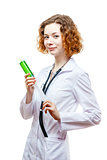 cute redhead doctor in lab coat with syringe