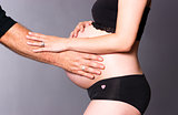 Man Woman Partners Expecting Baby Both Touch Hands Pregnant Stom