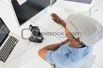 Young man working on computer in office