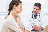 Doctor and patient in discussion at medical office