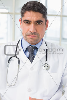 Portrait of a serious male doctor