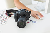 Digital camera on photographers desk