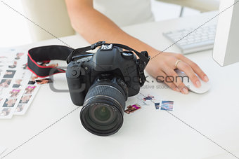 Digital camera on photographers desk