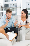 Unhappy man talking at couples therapy session