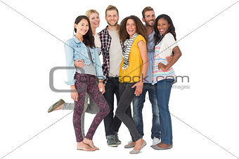 Happy group of young friends smiling at camera