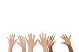 Three pairs of hands waving