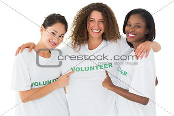 Attractive team of volunteers smiling at camera