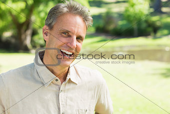 Cheerful man in park