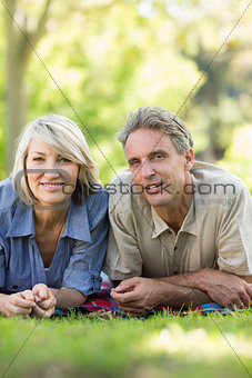 Couple relaxing in park