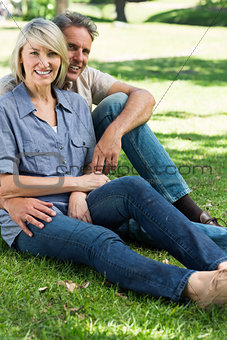 Loving couple relaxing in park