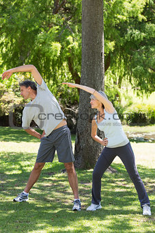 Couple exercising in the park