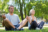 Couple sitting in lotus position