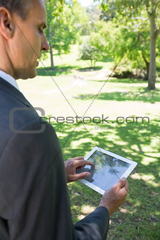 Businessman using tablet PC