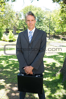 Businessman carrying briefcase