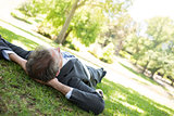 Businessman relaxing in park