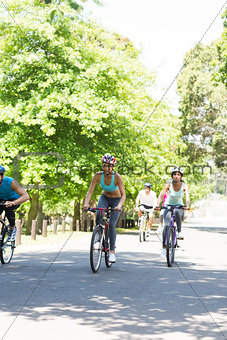 Group of cyclists riding bikes